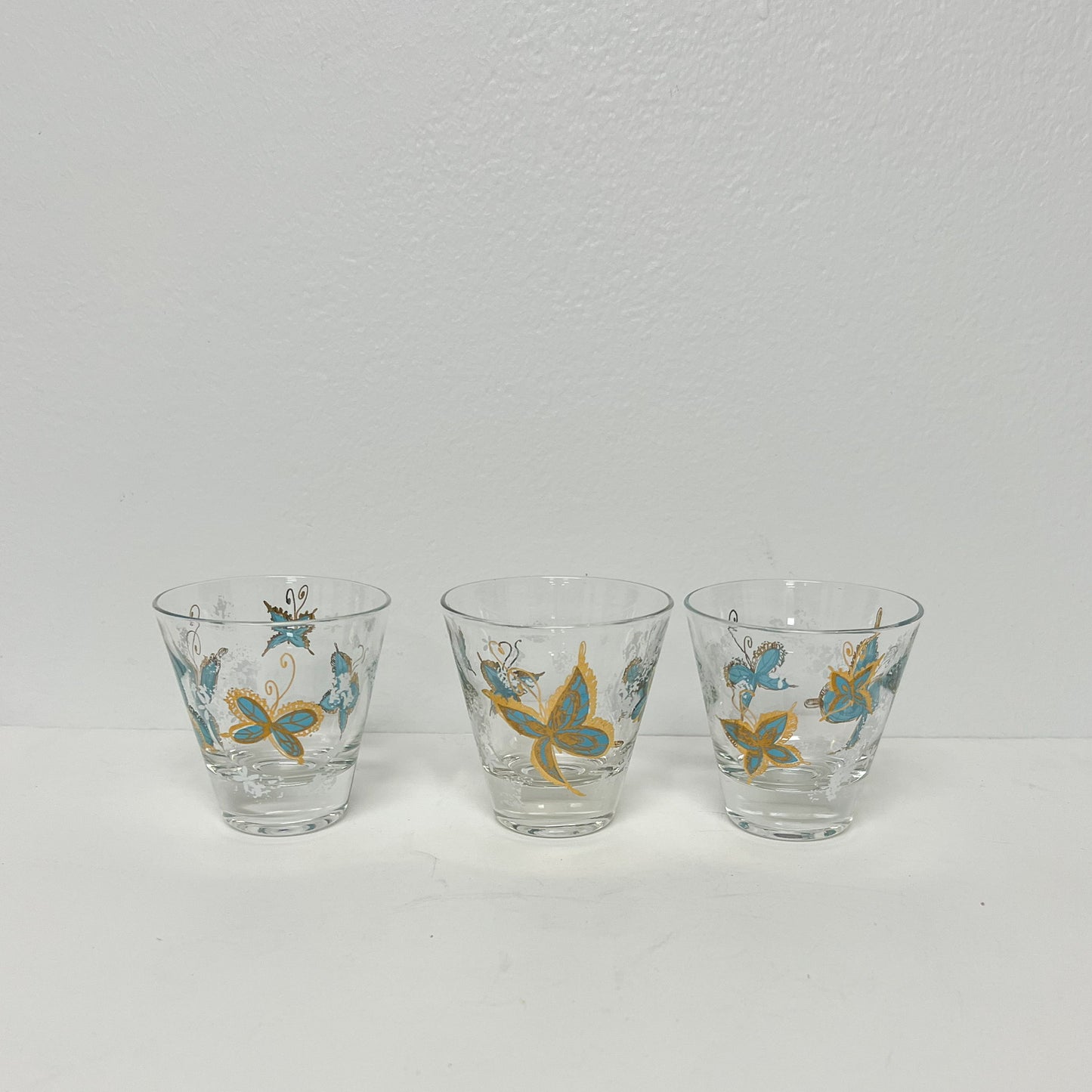 (20966A) Seven Small Butterfly Whiskey Glasses By Psyche