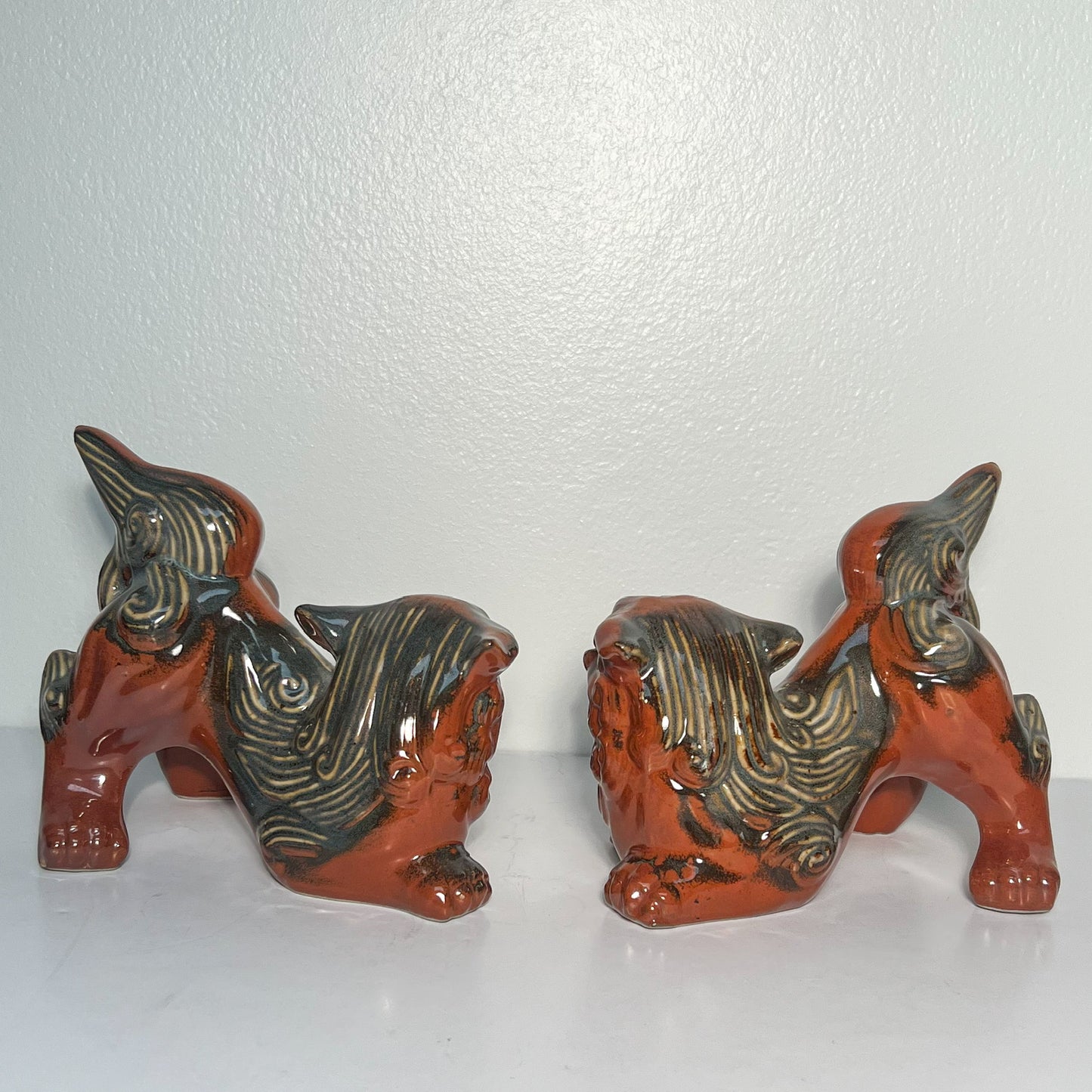 (21844) Pair of Rust Colored Pottery Foo Dogs