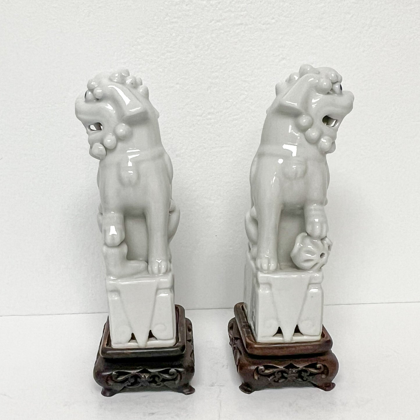 (26451) Pair of Ca. 1920 Blanc Chine Foo Dogs with Wooden Stands