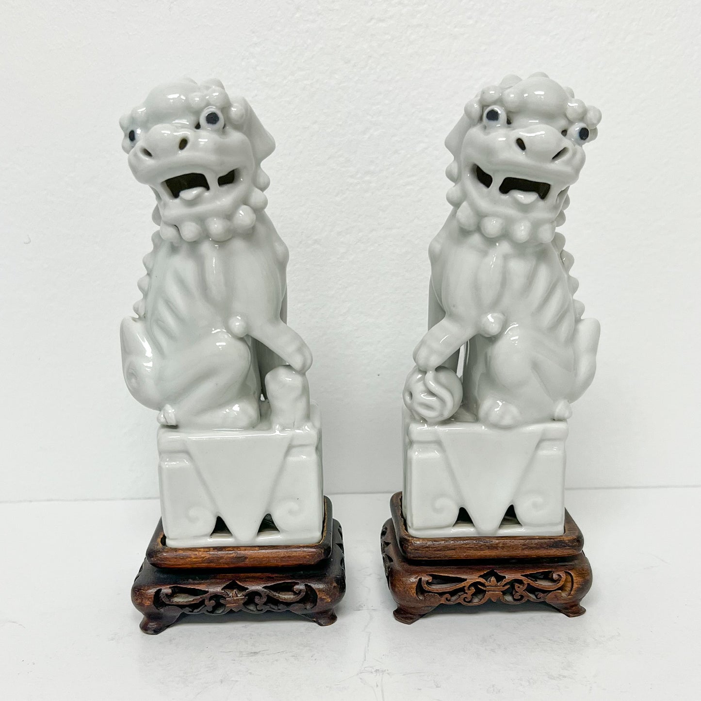 (26451) Pair of Ca. 1920 Blanc Chine Foo Dogs with Wooden Stands