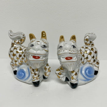 (23015) Pair of Midcentury White and Gold Foo Dogs Riding Blue Waves