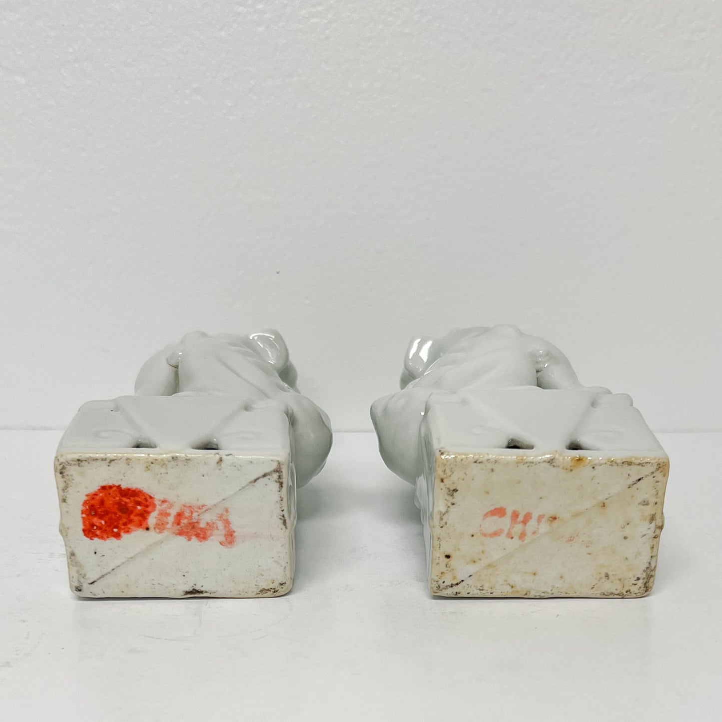 (26451) Pair of Ca. 1920 Blanc Chine Foo Dogs with Wooden Stands