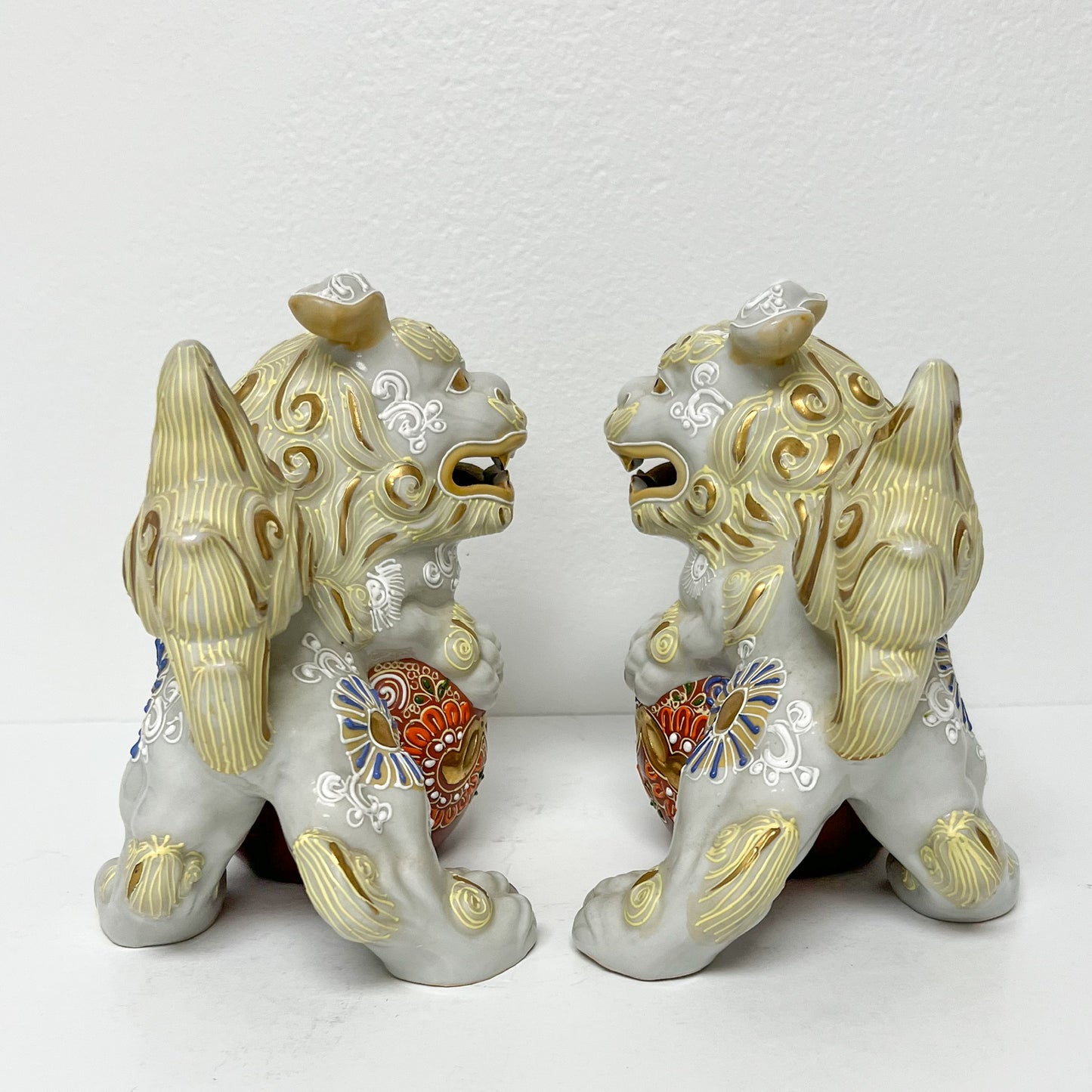 (26374) Pair of Cream Colored Imari Style Foo Dogs