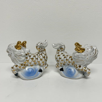 (23015) Pair of Midcentury White and Gold Foo Dogs Riding Blue Waves